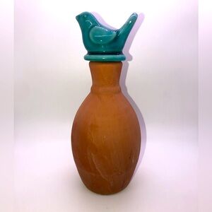 Terracotta bottle vase with crackle bird stopper